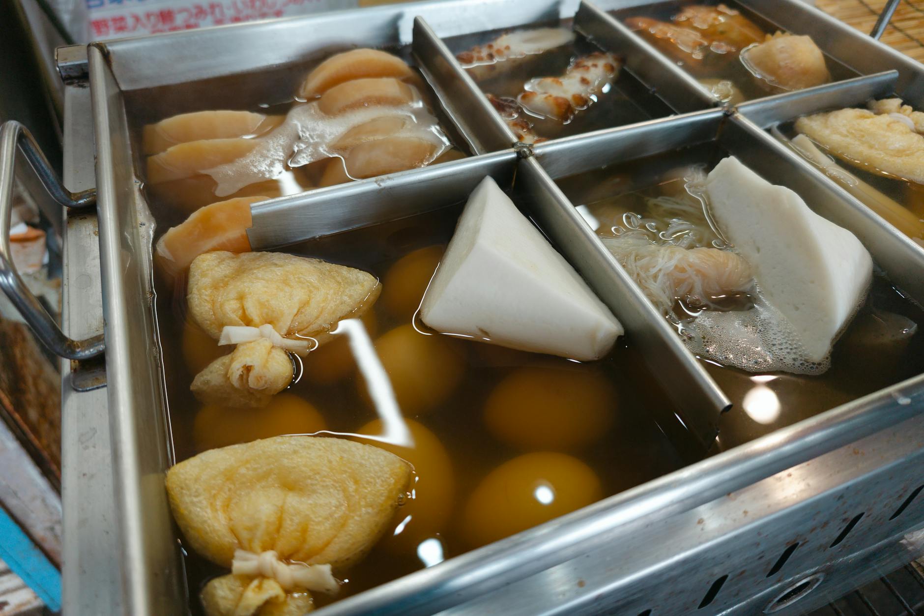 pots with food in water