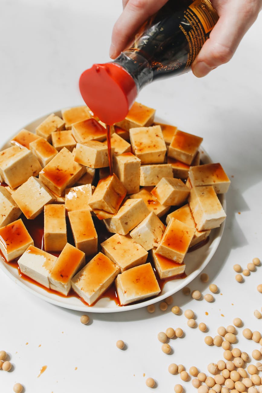 sliced tofu on white ceramic plate